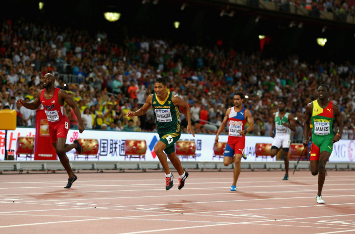 Wayde van NIekerk of South Africa will be seeking to reproduce his world 400m title win of last year in Beijing, where he headed LaShawn Merritt (left) and Kirani James (right) as all three broke 44sec ©Getty Images