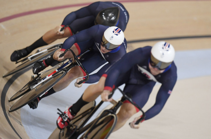 Britain's Philip Hindes, Jason Kenny and Callum Skinner at full pelt en route to team sprint gold at the Rio Olympic Velodrome on the first day of cycling's track programme ©Getty Images