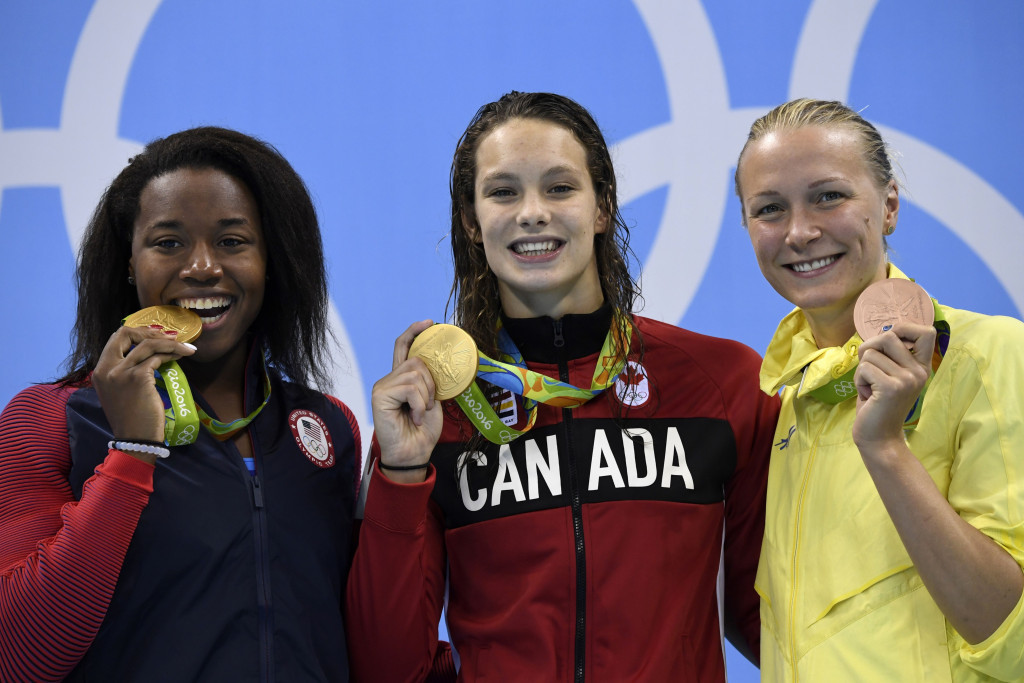 Simone Manuel (left) became the first black female to win an Olympic swimming gold ©Getty Images