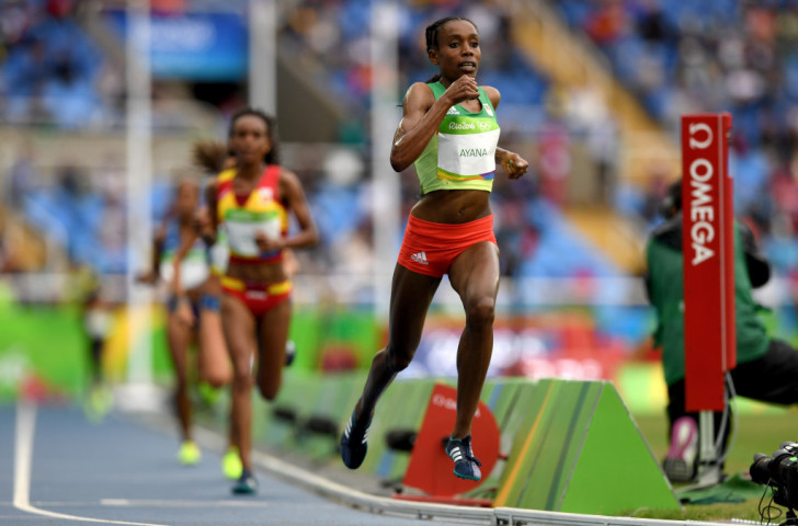 Almaz Ayana of Ethiopia strides out en route to her Olympic 10,000m victory in a world record of 29:17.54 on the opening morning of the Rio 2016 athletics programme  ©Getty Images