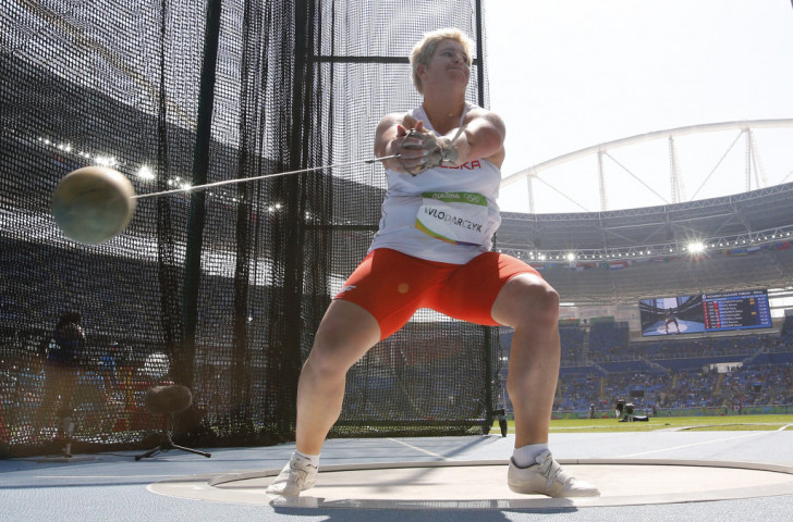 Poland's Anita Wlodarczyk improved her world hammer throw record to 82.29m, earning an Olympic gold medal four years after taking silver at London 2012, and dedicated the victory to her late friend Kamila Skolimowska ©Getty Images