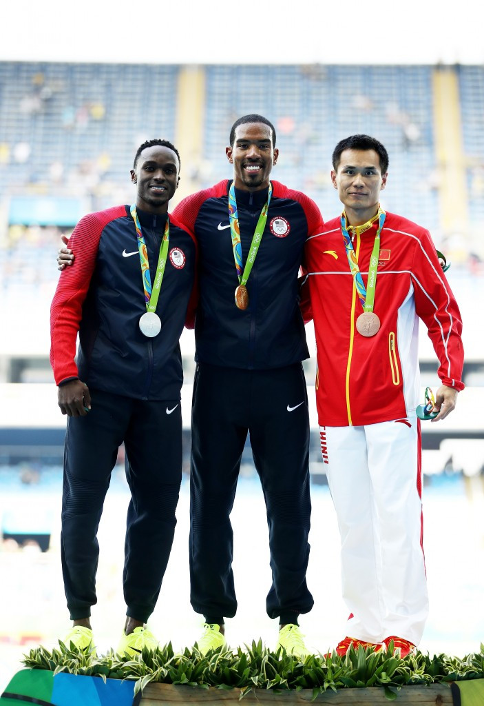 Christian Taylor successfully defended his triple jump title with silver going to US team-mate Will Claye (left) and bronze to China's Bin Dong ©Getty Images