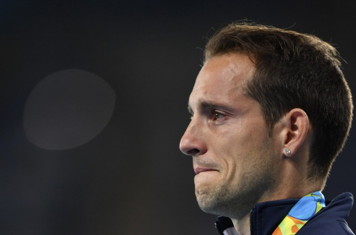 Olympic pole vault silver medallist Renaud Lavillenie shows his emotions as he is booed at the medal ceremony ©Getty Images
