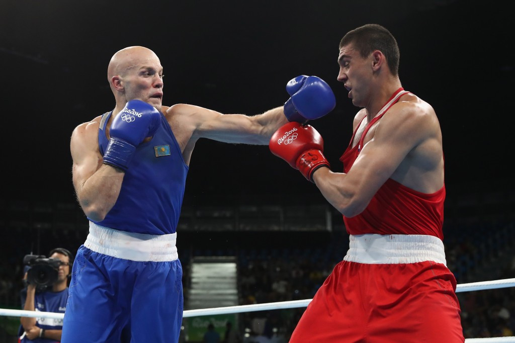 Evgeny Tishchenko (right) was controversially awarded heavyweight gold over Vassiliy Levit of Kazakhstan ©Getty Images