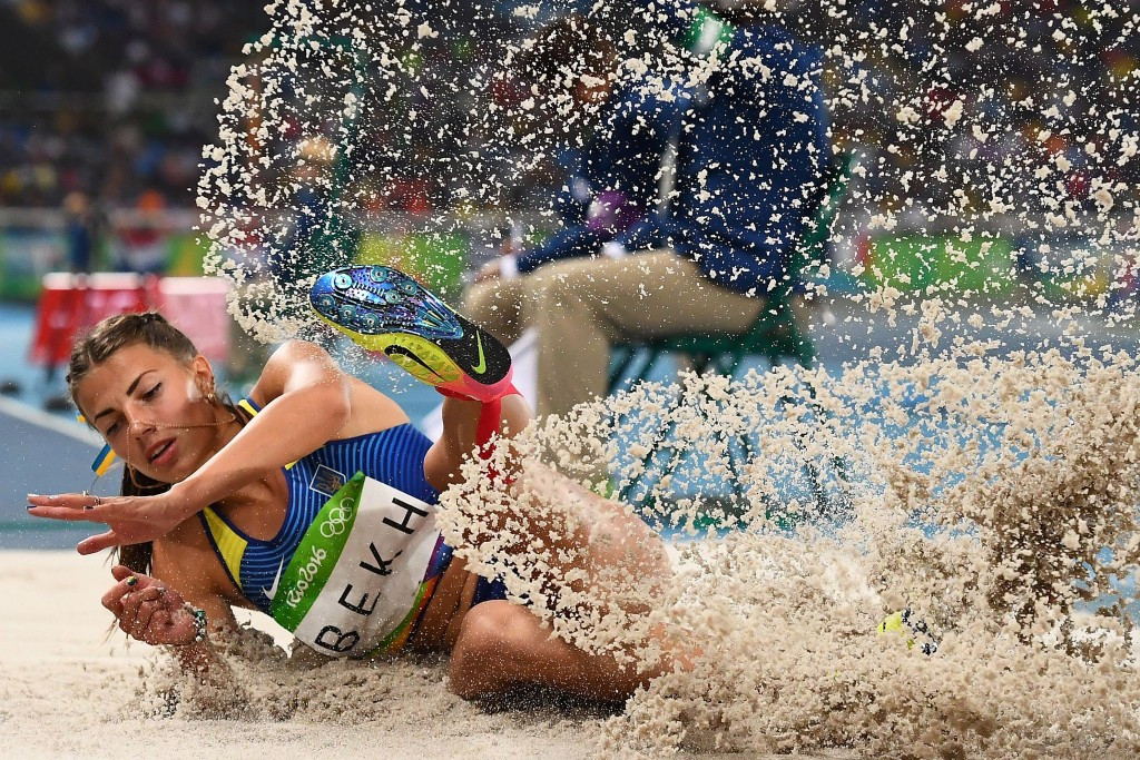 Ukraine's Maryna Bekh sprays the sand in the women's long jump final ©Getty Images