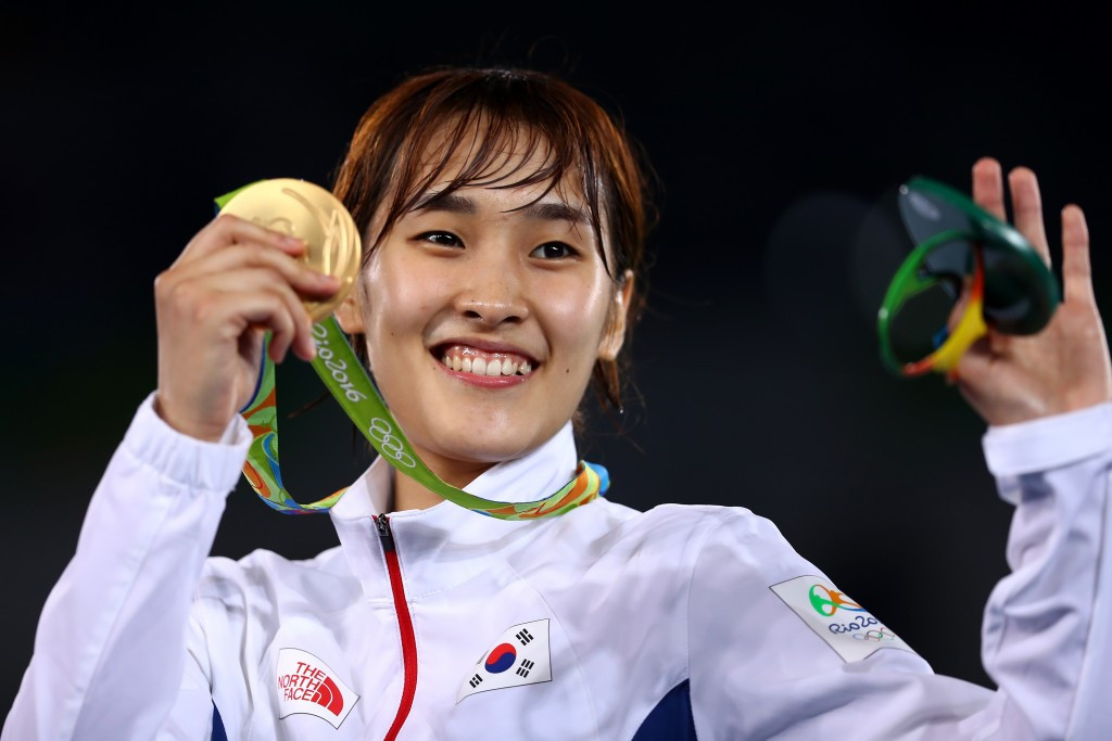 Mixed fortunes for China as Zhou wins while Wu falters on opening day of Rio 2016 taekwondo competition