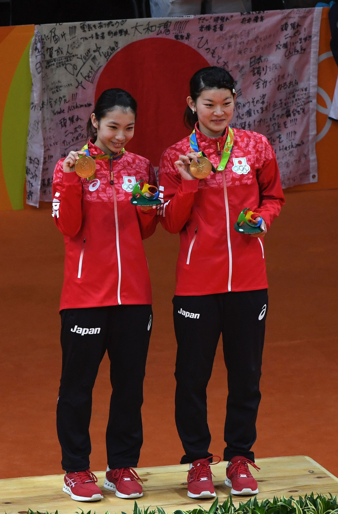 Japan's Misaki Matsutomo and Ayaka Takahashi came from a game down and trailing 19-6 in the last game against Denmark to claim their country's first-ever Olympic gold medal in badminton ©Getty Images