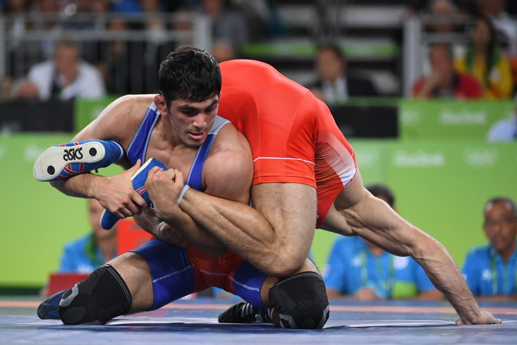 Iran's Hassan Aliazam Yazdanicharati marked his Olympic debut by winning the men's 74kg freestyle gold medal in a final against Russia's Aniuar Geduev ©Getty Images