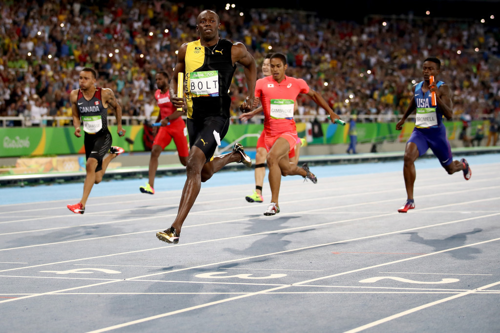 Usain Bolt strides clear to win for Jamaica ahead of the Japan and the US ©Getty Images