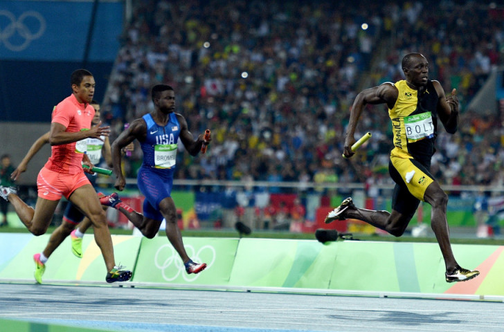 Usain Bolt crosses the finish line to earn Jamaica the 4x100m title and himself his third Olympic gold at Rio 2016 - and his ninth overall since Beijing 2008 having won the 100m/200m/4x100m at three consecutive Games ©Getty Images