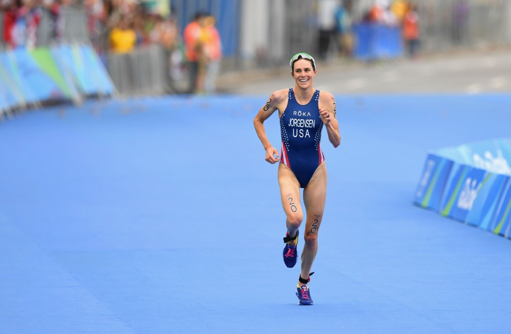 Favourite Jorgensen holds off strong Spirig challenge to win women's Olympic triathlon gold medal