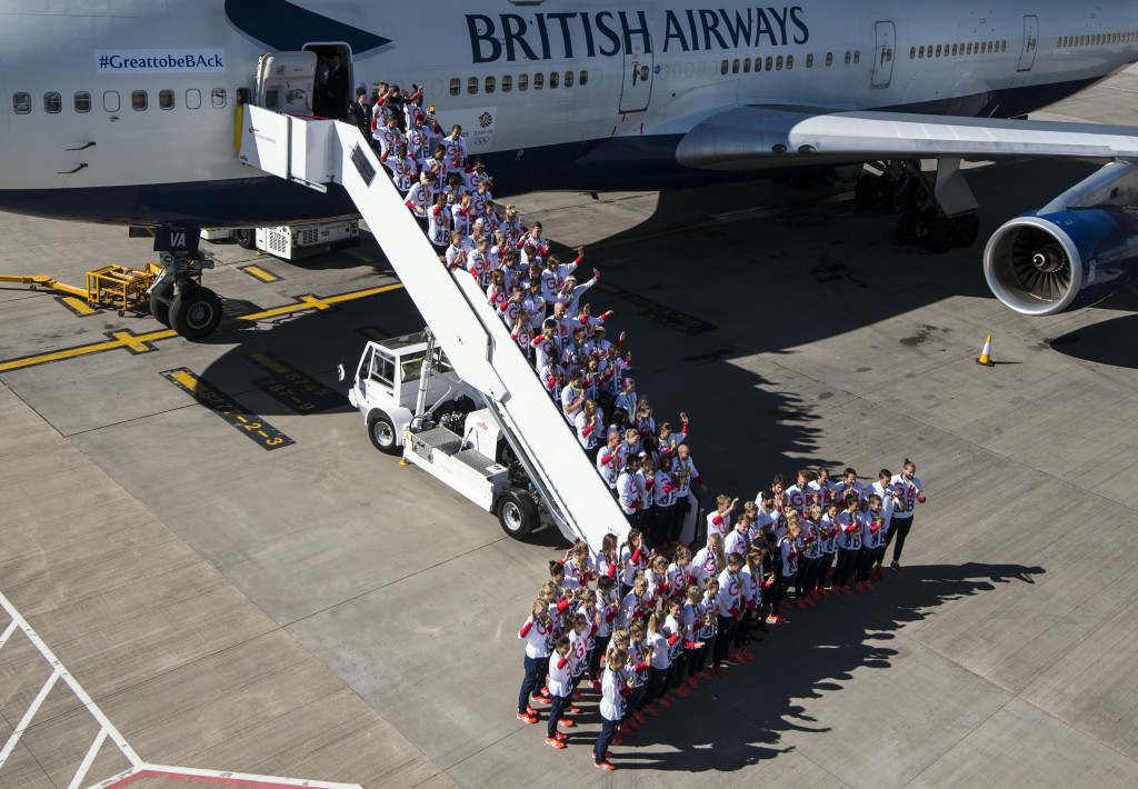 British athletes file off the plane on their return to London ©Getty Images