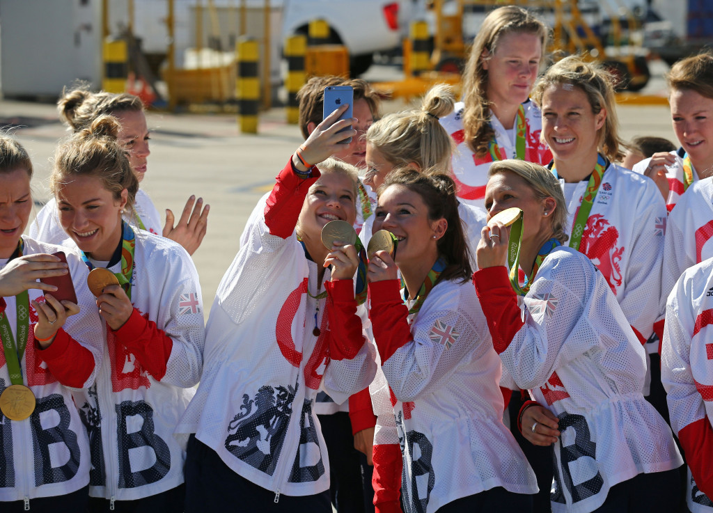 British team members take photographs with their medals ©Getty Images