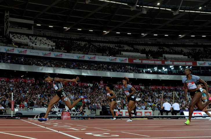 Kendra Harrison of the United States setting a world 100m hurdles record of 12.20sec at last month's London Anniversary Games. She wants to go even faster tomorrow at the IAAF Diamond League meeting in Paris ©Getty Images