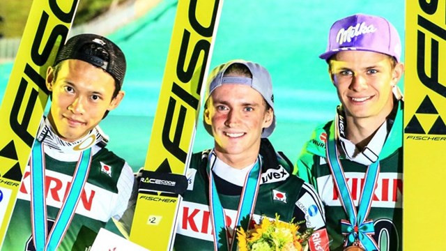 Anders Fannemel (centre) won the first of the  two competitions ahead of local hero Taku Takeuchi (left) and Andreas Wellinger (right) of Germany ©FIS