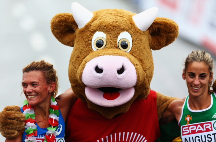 Cooly, the Swiss sporting mascot, out and about on the women's Marathon course at the 2014 European Athletics Championships in Zurich. Last night he was in the city again, trying his hoof at pole vaulting - to good effect - as he boosted crowds at an IAAF Diamond League event held in the city's main station ©Getty Images