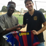 A signed Barcelona shirt is presented to the Gambian National Olympic Committee President ©GNOC