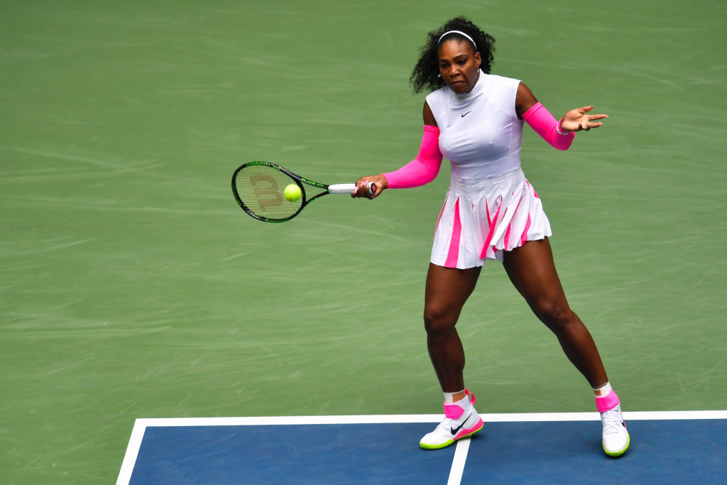 Williams claims record-breaking victory as Wawrinka wins epic at US Open