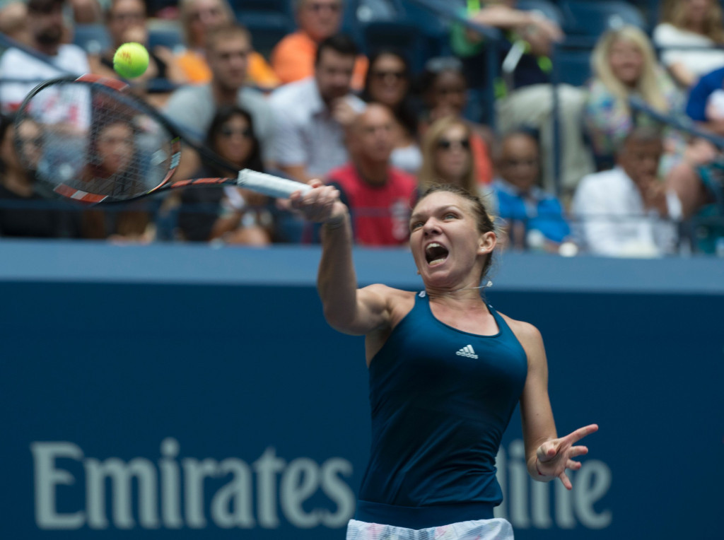 Romania's Simona Halep showed visible signs of frustration before beating Timea Babos of Hungary ©Getty Images