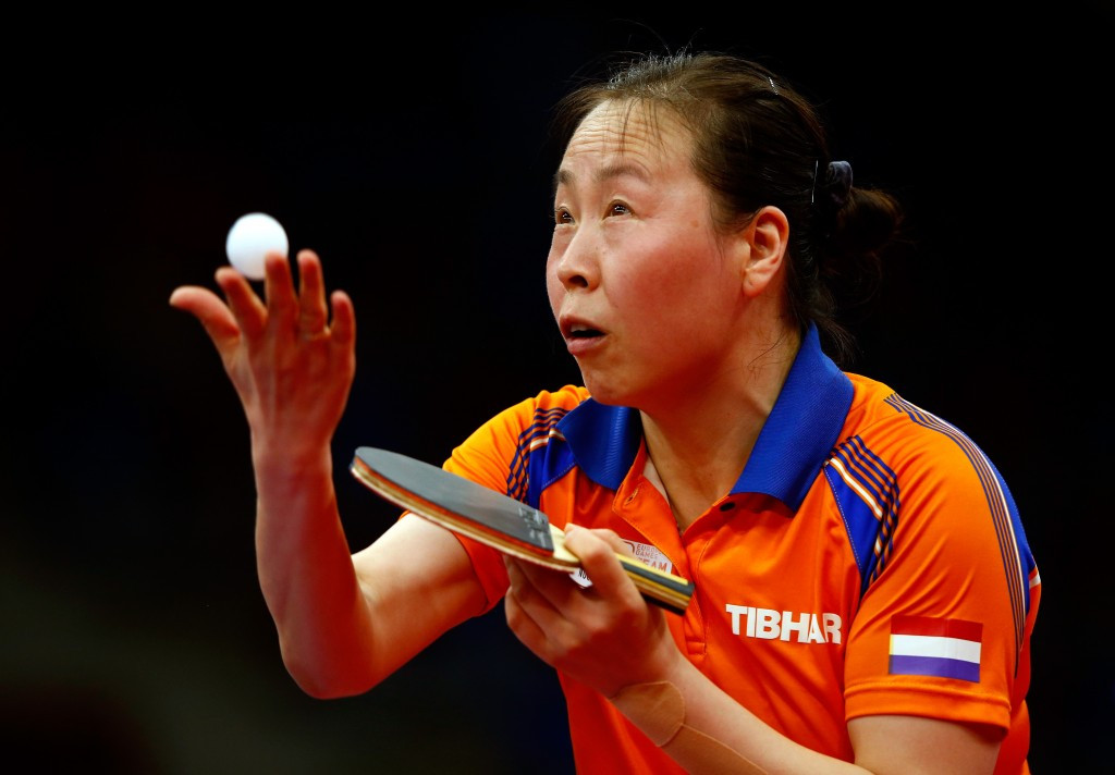 Li Jiao of The Netherlands sealed the women's title with a comfortable win over compatriot Li Jie