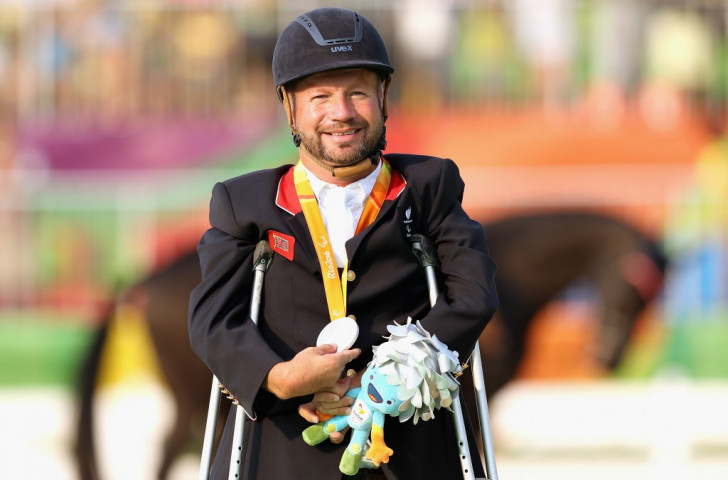 Britain's Lee Pearson, ten times a Paralympic champion in equestrianism, pictured with his latest medal - a silver - at his fifth Games ©Getty Images