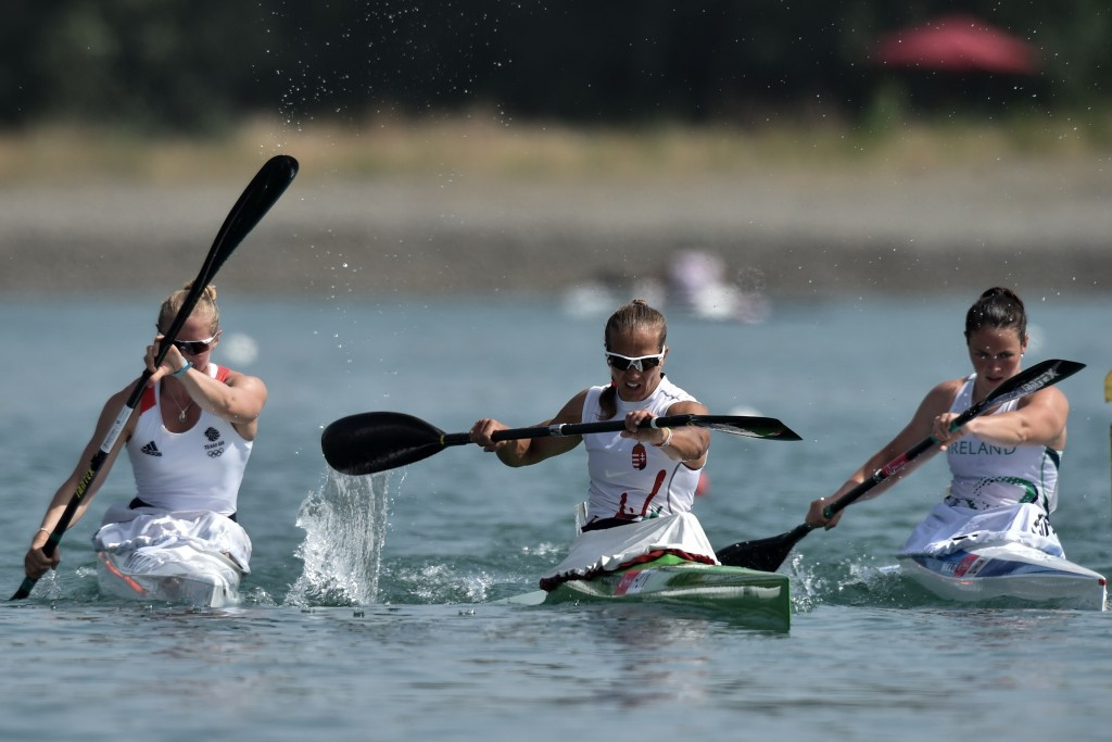 Renata Csay (Centre) of Hungary and South Africa's Hank McGregor won gold in their respective men's and women's kayak singles events at the 2016 ICF Canoe Marathon World Championships in Germany ©ICF