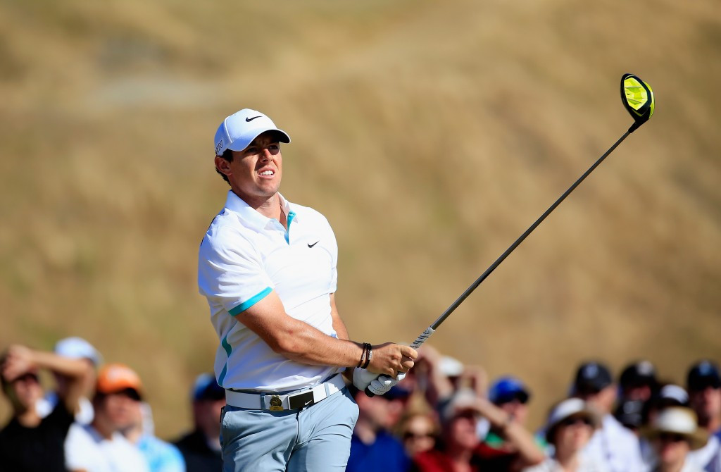 Northern Ireland's Rory McIlroy narrowly avoided missing the cut but remains nine shots off the pace