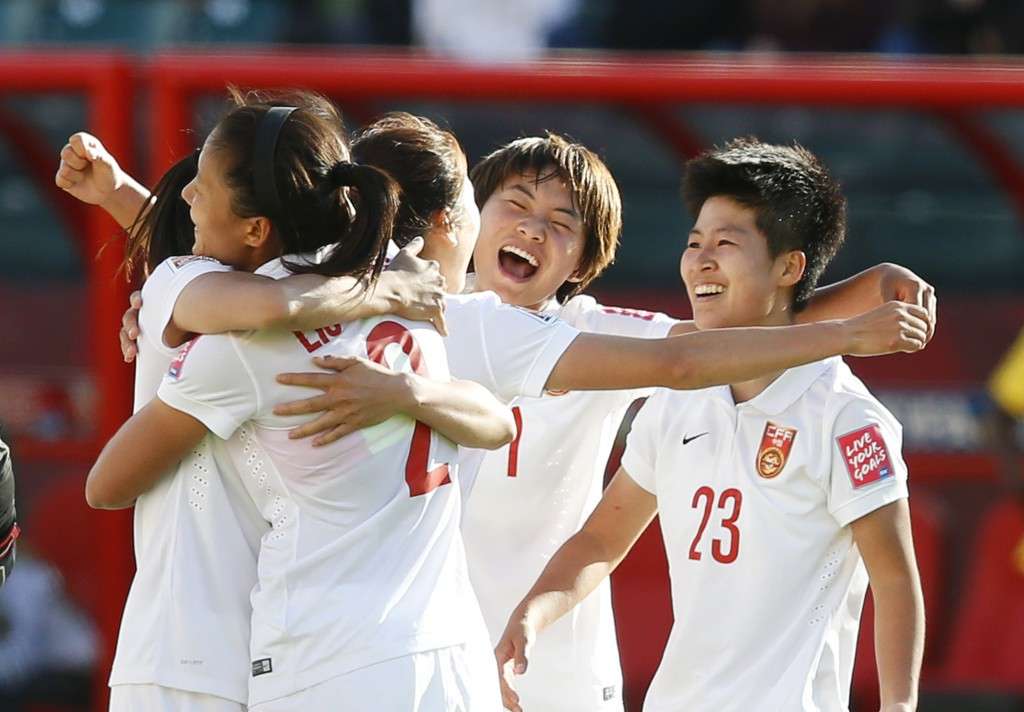 China secured their place in the last eight with a narrow 1-0 win over Cameroon