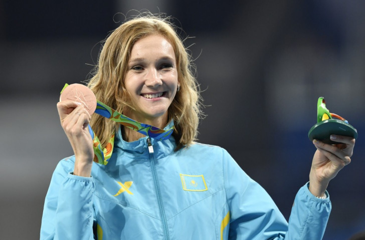 London 2012 triple jump champion Olga Rypakova of Kazakhstan, showing off her bronze medal from Rio 2016, now stands to add another bronze to her collection from Beijing 2008 ©Getty Images