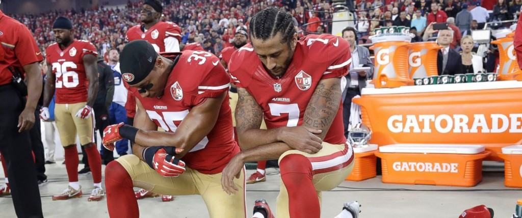 NFL star Colin Kaepernick, right, is among sports stars under fire from President Donald Trump for kneeling during the national anthem as part of protests ©Getty Images