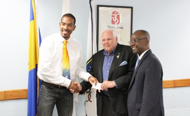 The Barbados Olympic Association held a special lunch in honour of American athlete Christian Taylor (left) at its headquarters ©BOA