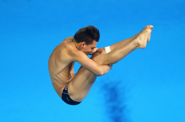 Italy's Ruslan Adriano Cristofori competes during the men's diving three metres springboard final ©Getty Images