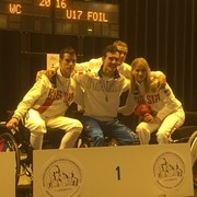 Emanuele Lambertini of Italy, centre, defeated Russia's Oleg Gavrilenkov in the final of the under-17 mixed foil competition at the IWAS Wheelchair Fencing World Championships ©IWAS