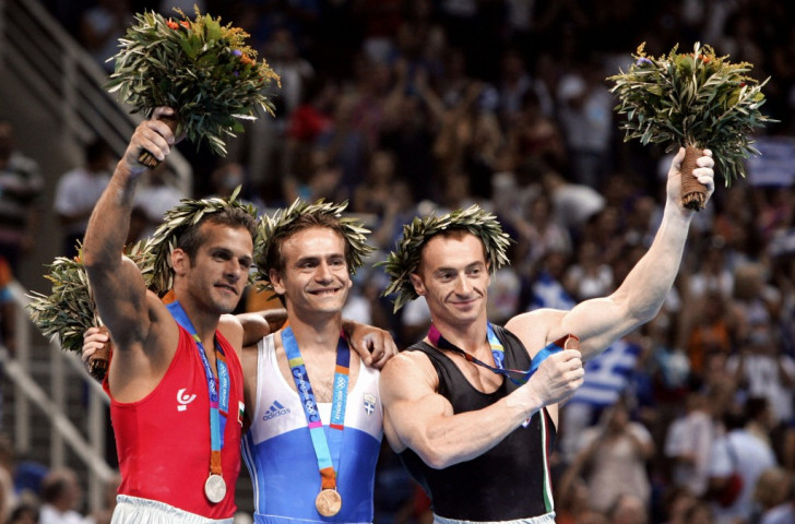 
The decision to award Bulgaria's world champion Jordan Jovtchev silver in the Athens 2004 rings discipline behind home gymnast Dimosthenis Tampakos was widely questioned. Italy's bronze medallist Yuri Chechi made it clear that he regarded the Bulgarian as the true winner. Something had to change - and it soon did ©Getty Images