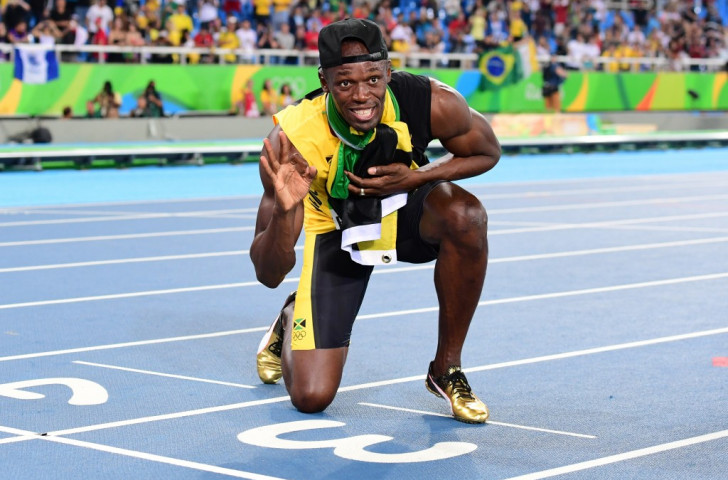 Usain Bolt celebrates winning a third Olympic sprint relay title from lane three at the Rio Games - now he has marked out his final race on home soil next year ©Getty Images