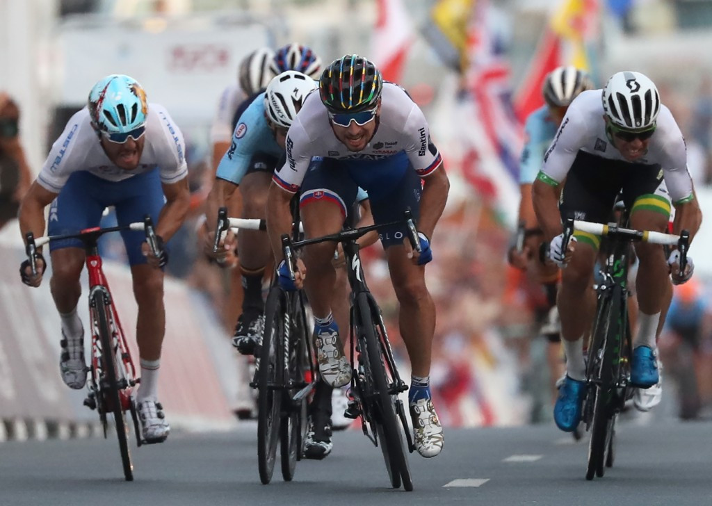 Sagan becomes sixth man to defend world road race title after sprinting to victory in Doha