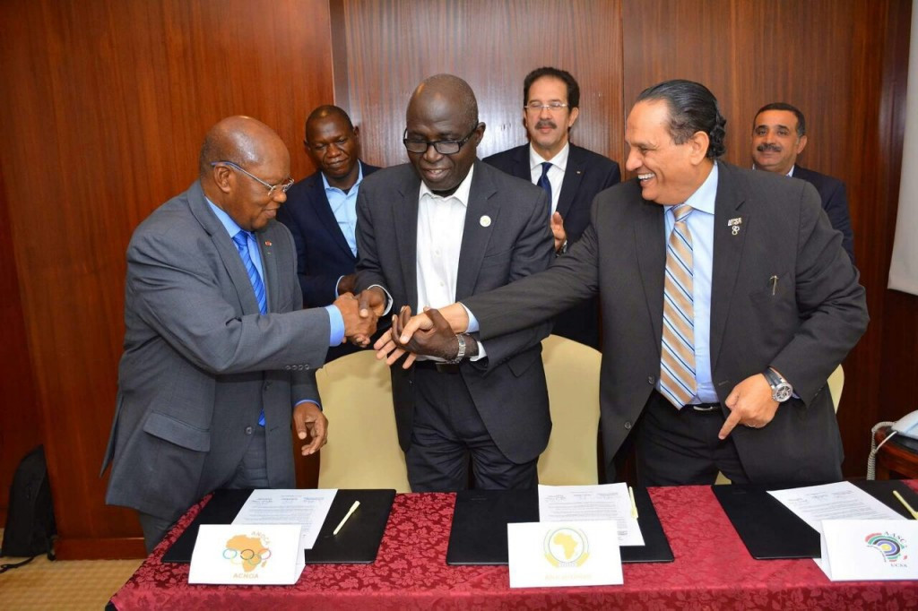 Ivorian Lassana Palenfo (left) alongside ANOCA and African Union officials ©ANOCA