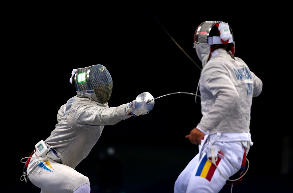 Andriy Yagodka won the men's individual sabre with a shock win over Romanian world number three Tiberiu Dolniceanu