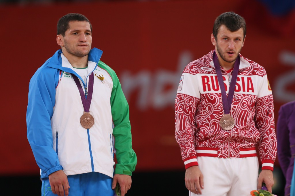 Soslan Tigiev (left) has now been stripped of medals won at two Olympic Games ©Getty Images