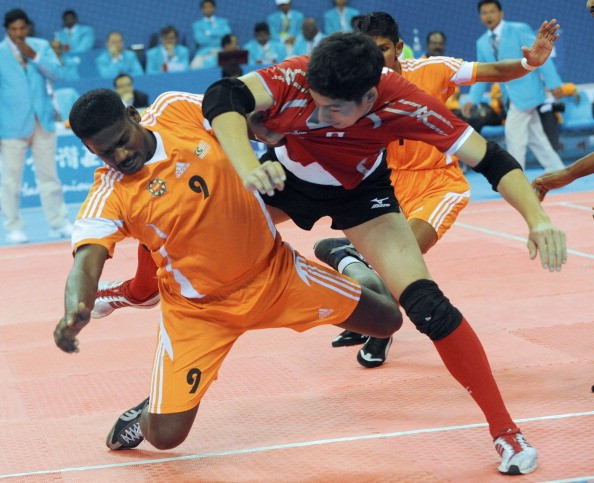 Maniam Manikkam has been a mainstay of the Malaysian kabaddi team, pictured here competing at the Guangzhou 2010 Asian Games ©AFP/Getty Images