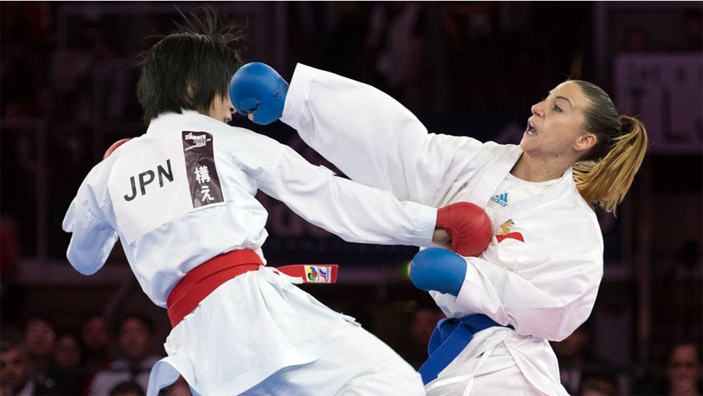 Alexandra Recchia, right, won the women's under 50kg individual kumite title before helping her country France to top honours in the women's team final ©WKF