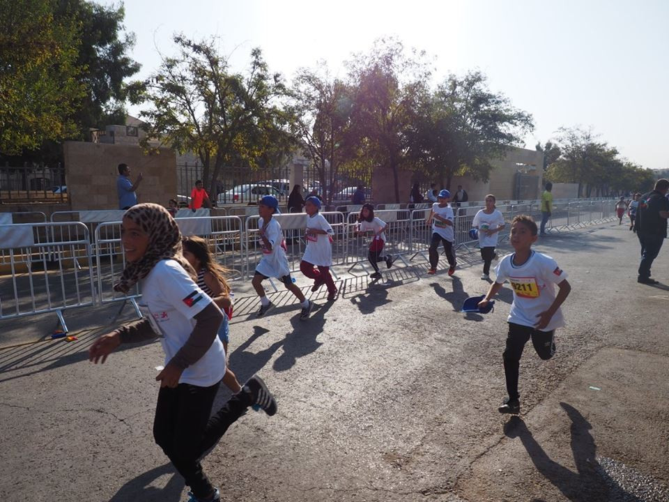 Taekwondo Humanitarian Foundation youngsters take part in children's race at Amman Marathon
