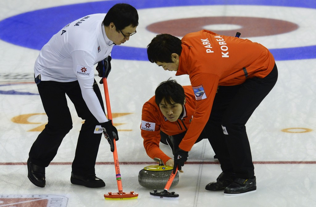 The South Korean team skipped by Soo Hyuk Kim (centre) will be aiming to retain their title on home ice ©Getty Images