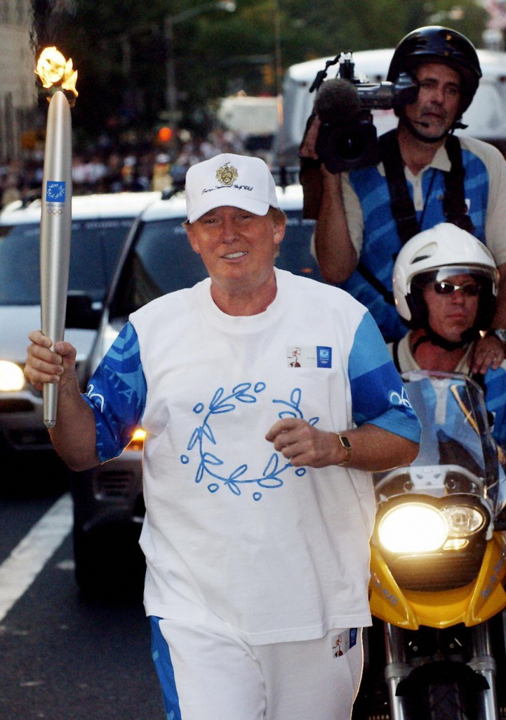 Donald Trump pictured carrying the Olympic Torch during the Athens 2004 Torch Relay ©Getty Images