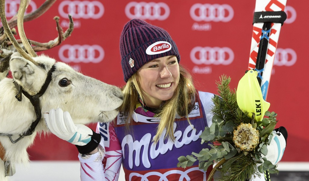 Mikaela Shiffrin celebrates her victory in Levi with a reindeer she was allowed to name ©Getty Images 