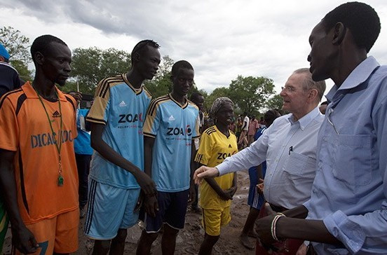 Former IOC President Jacques Rogge meeting South Sudanese refugees on a visit to Ethiopia last month ©Petterik Wiggers/UNHCR