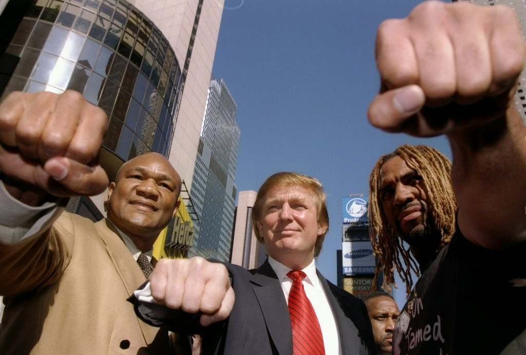 President-elect Donald Trump with boxers George Foreman (left) and Shannon Briggs (right) in New York City in 1997 ©Getty Images