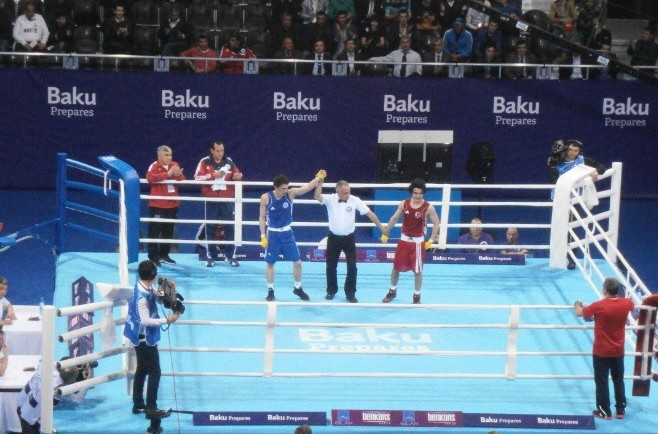 Zaur Abdullayev (left) enjoyed victory in his first contest representing Azerbaijan as he beat Turkey’s Adem Furkan Avci in the Baku 2015 test event at the Crystal Hall 