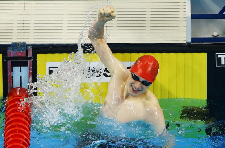 Britain's Luke Greenbank celebrates one of only two non-Russian wins in the  pool today having set a world junior record of 1:56.89 in the men's 200m backstroke 