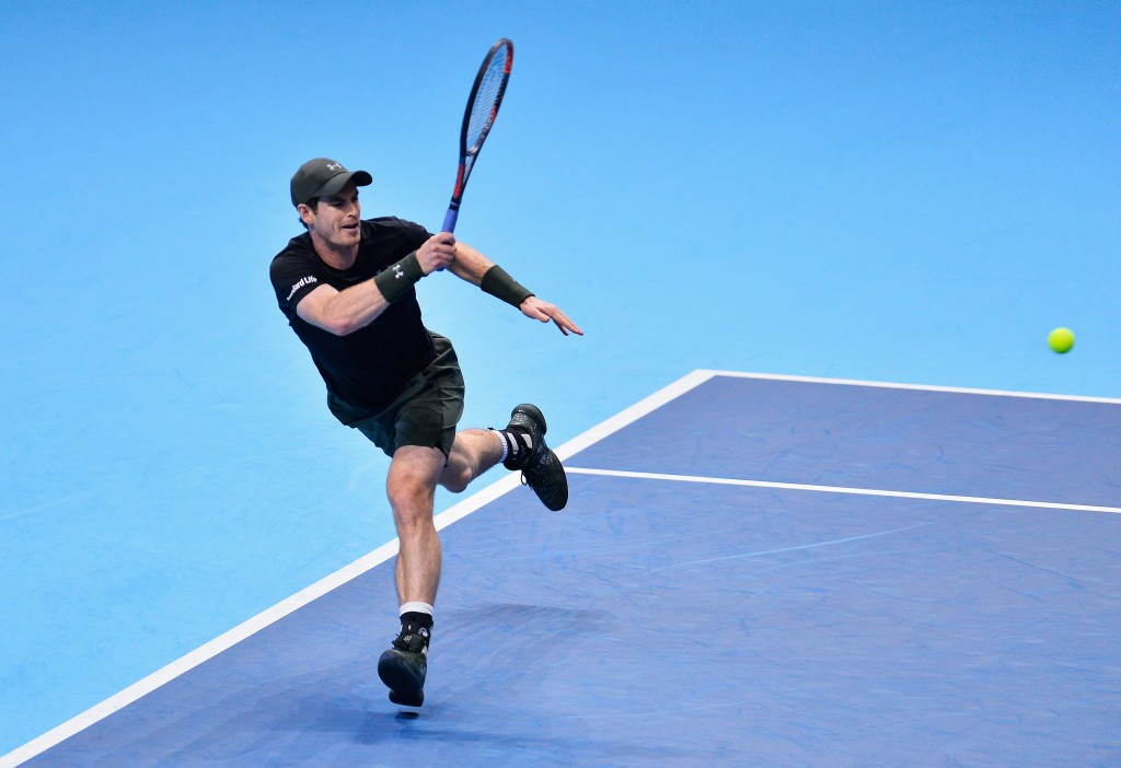 World number one Murray books place in last four of ATP World Tour Finals with victory over Wawrinka